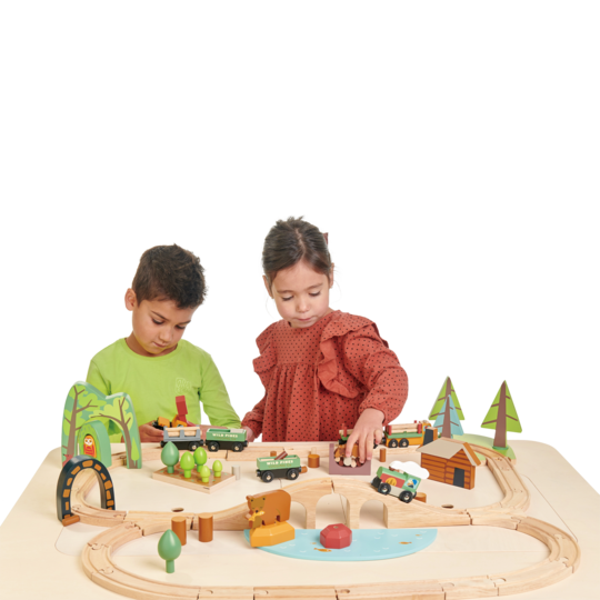 Table Kids Playing With Trains