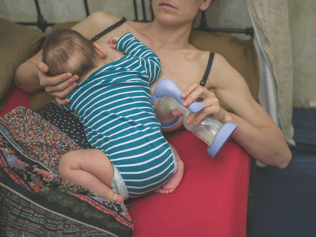Breastfeeding Mom Nursing and Hand Pumping