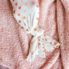 Copper Pearl Cupid Knit Swaddle Blanket
