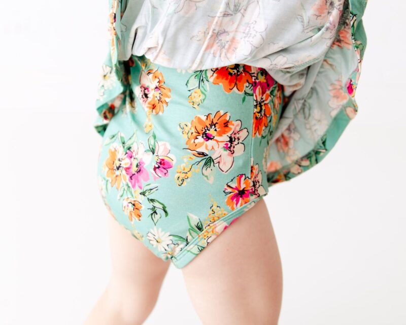 Flower Child Little Bow Bamboo Viscose Bodysuit Twirler available at Blossom
