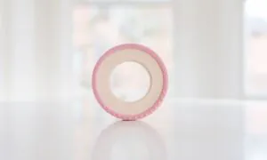 Bannor Toys Silicone Wrapped Wooden Teether in Rose