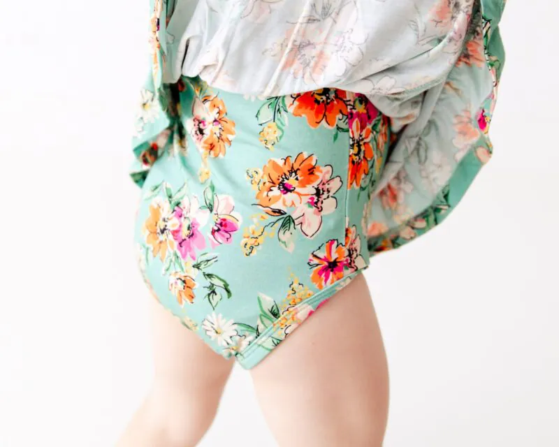 Flower Child Little Bow Bamboo Viscose Bodysuit Twirler available at Blossom