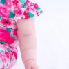 Rosie Bamboo Viscose Ruffle Zip Romper from Birdie Bean